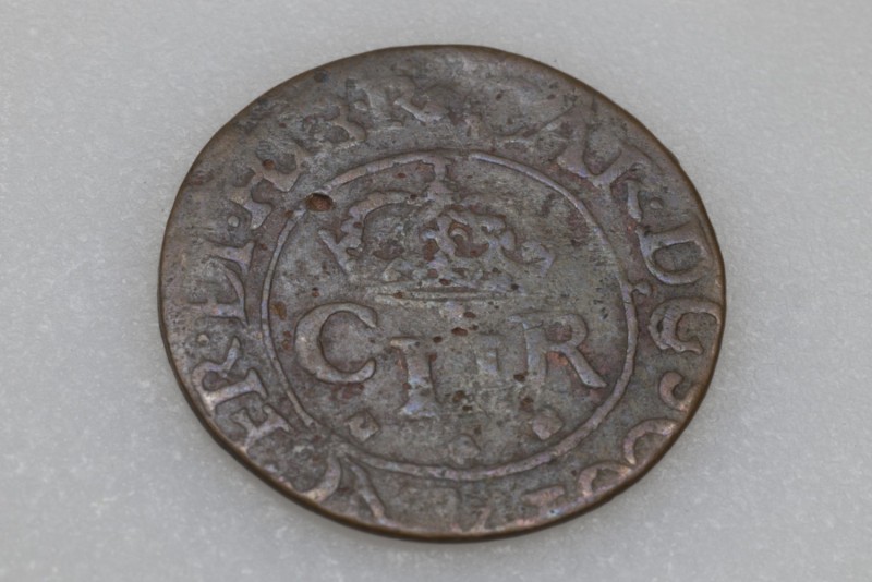 Obverse side of one of the coins
