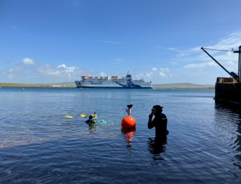 The temperature buoy being fixed in place.